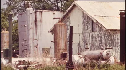 Abandoned oil field tools in Goliad County, TX. Photo from National Archives Catalog.